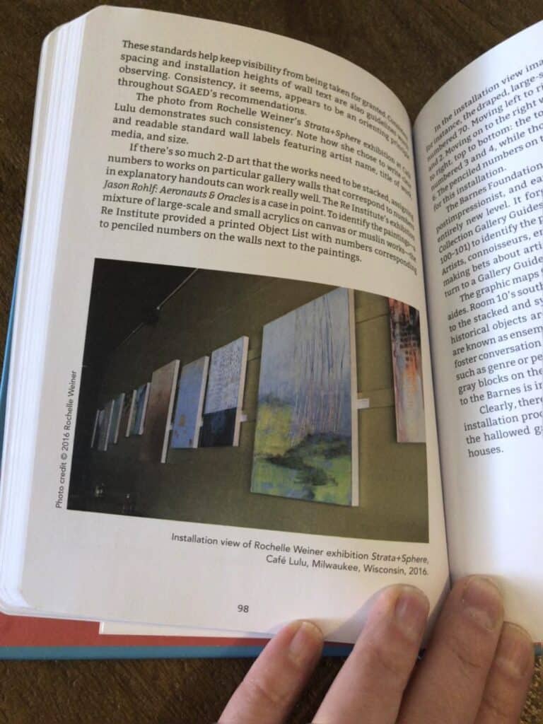 Book open to page showing one of my one-woman exhibitions.