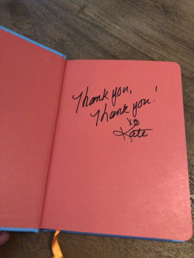 Inside cover page with signature from the author.