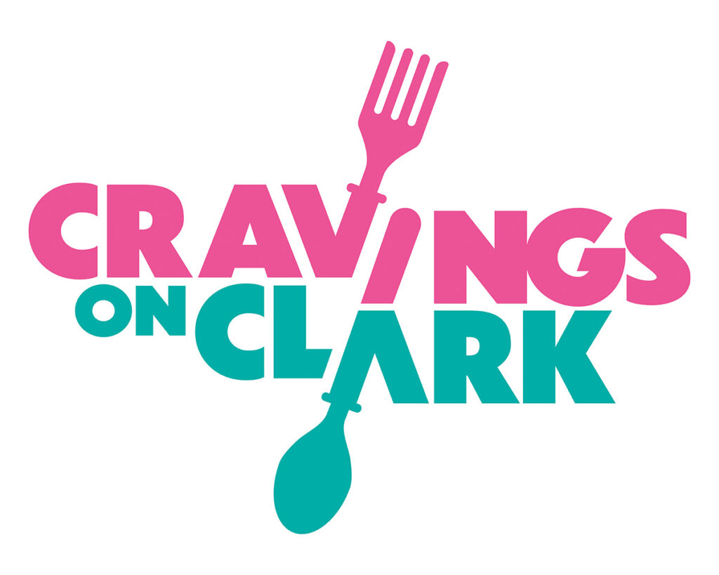 Cravings on Clark logo featuring a fork and spoon at dynamic angles.