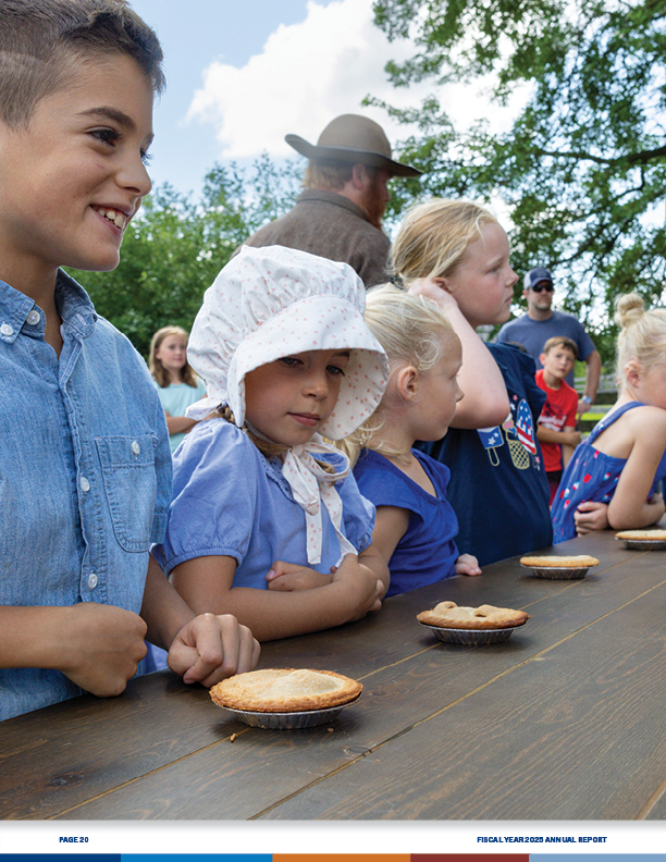 Page 20 - Large photo of children waiting to start the pie-eating contest.