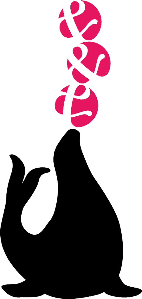 Seal balancing three andiamo logos on it's nose, like they are juggling balls.