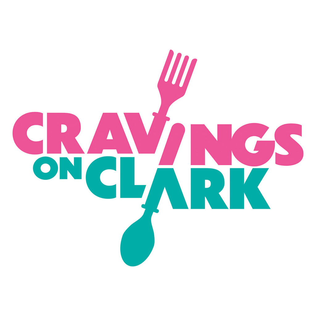 Cravings on Clark logo featuring a fork and spoon at dynamic angles.