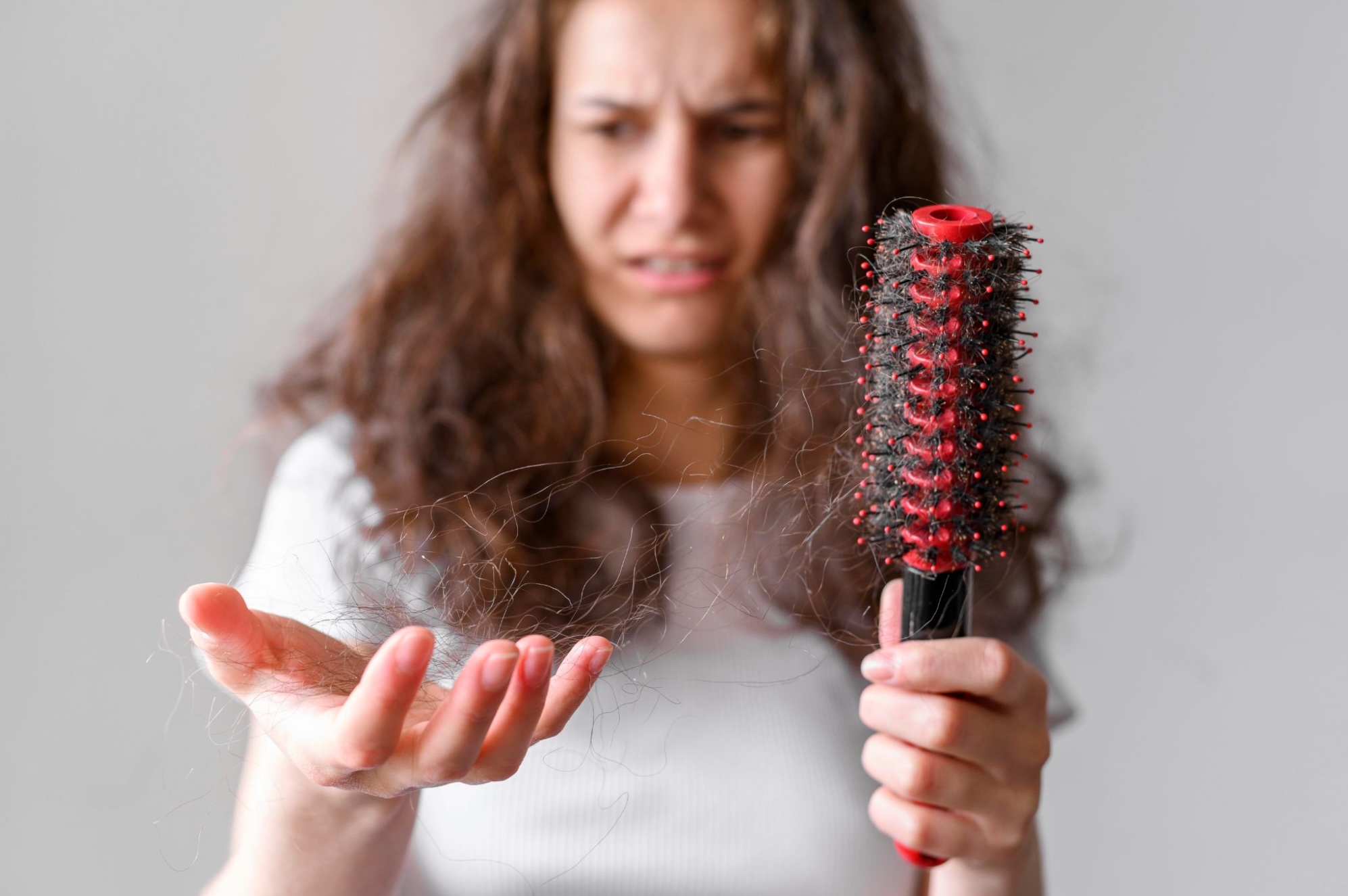 A women with hair falling problem