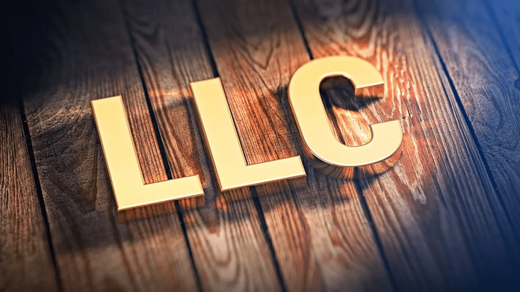 Brass LLC letters on wood — best business structure for non US persons Wyoming LLC