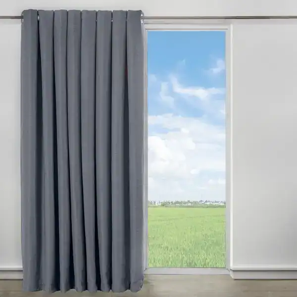 Ceiling and drywall installation with elegant grey curtains in a modern interior.