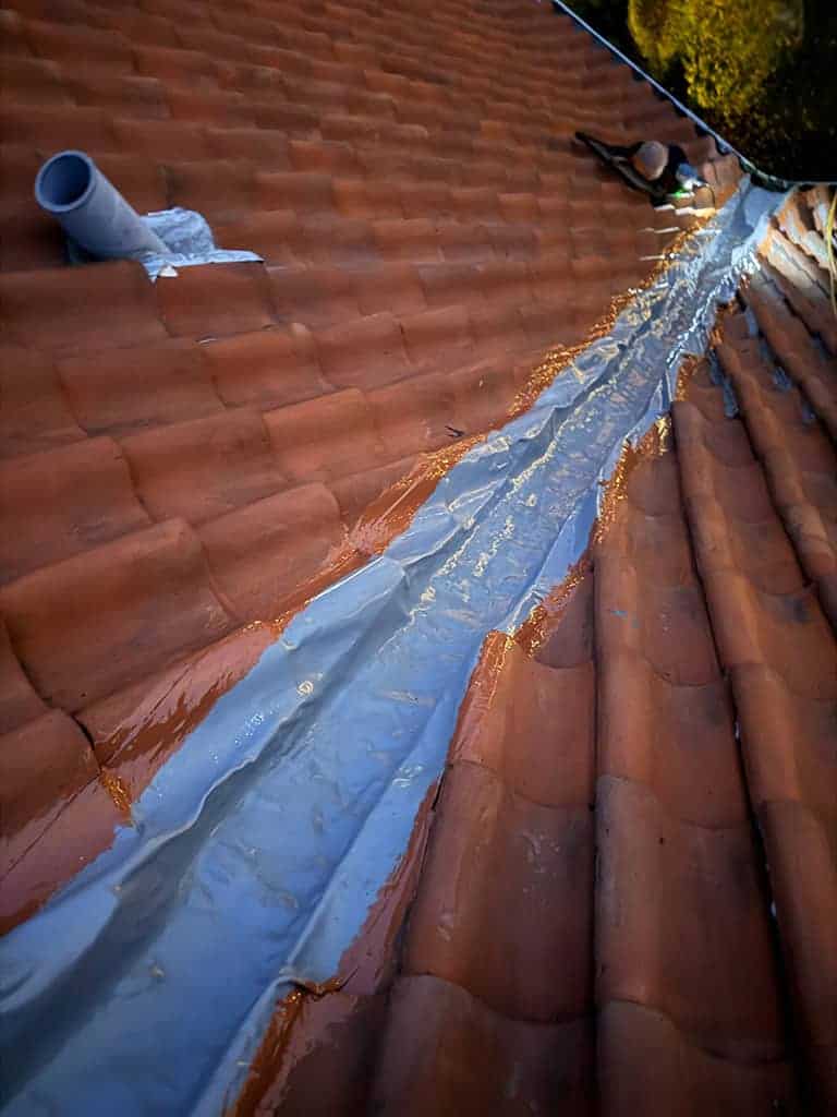 Skotrende på rødt tegltag