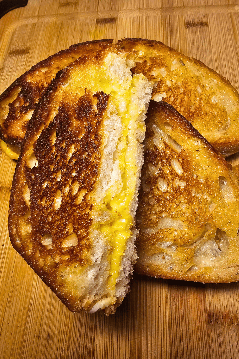 Delicious grilled cheese sandwich with melted cheese and crispy bread. Perfect comfort food for chee.