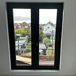 Modern black double glazed window installed by CP Glazing Ltd, offering enhanced security and insulation.
