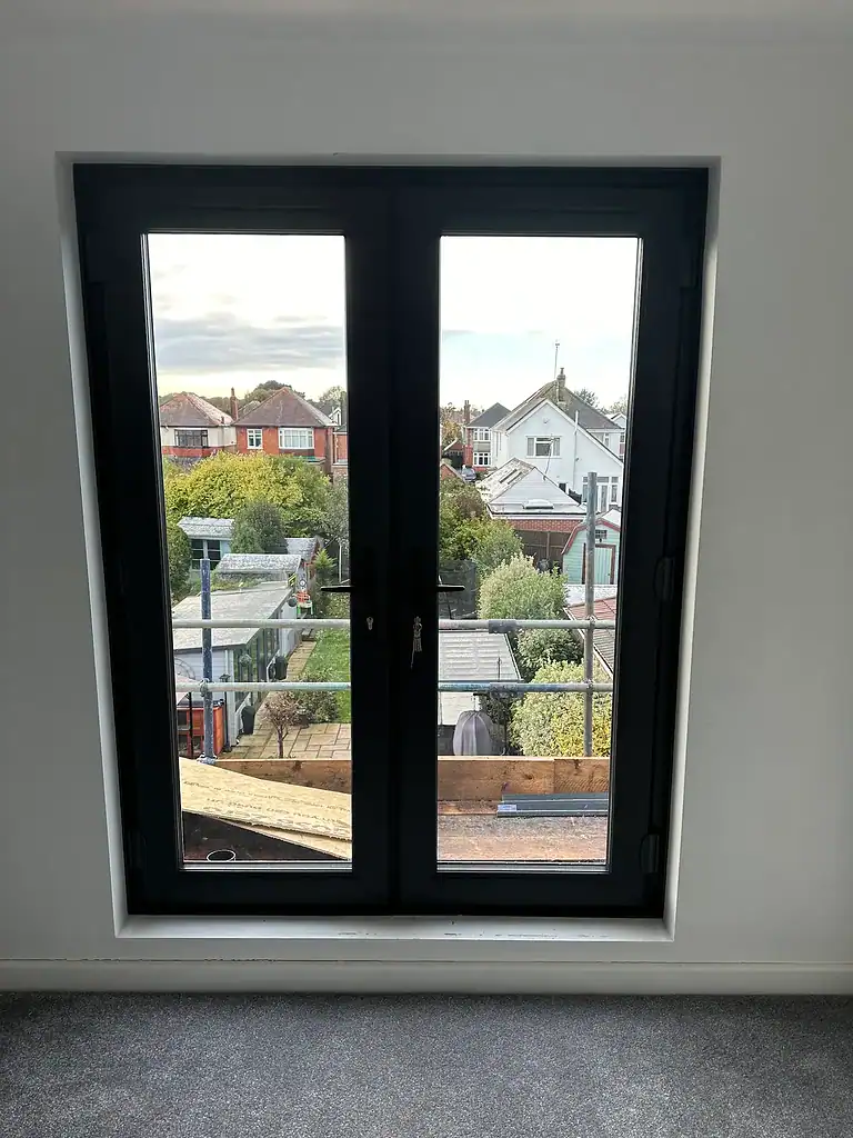 Modern black double glazed window installed by CP Glazing Ltd, offering enhanced security and insulation.