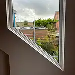 Modern white UPVC window with tilt and turn functionality, installed by CP Glazing Ltd. for enhanced insulation and aesthetics.