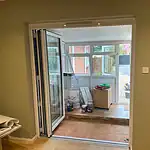 Modern PVC uPVC double glazed patio doors installation in a residential home.