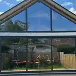 Double glazed patio doors and large glass roof installation by CP Glazing Ltd, specialising in bespoke glazing solutions.