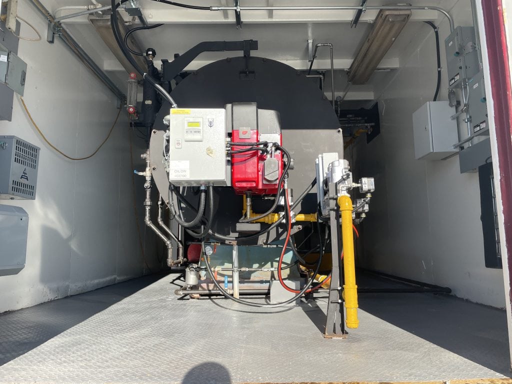 Mobile boiler rental Powermaster steam boiler equipped with an Oilon burner, supplied and serviced by Ecowaterlab for industrial steam applications.