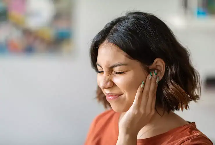 Décharge électrique dans l'oreille gauche