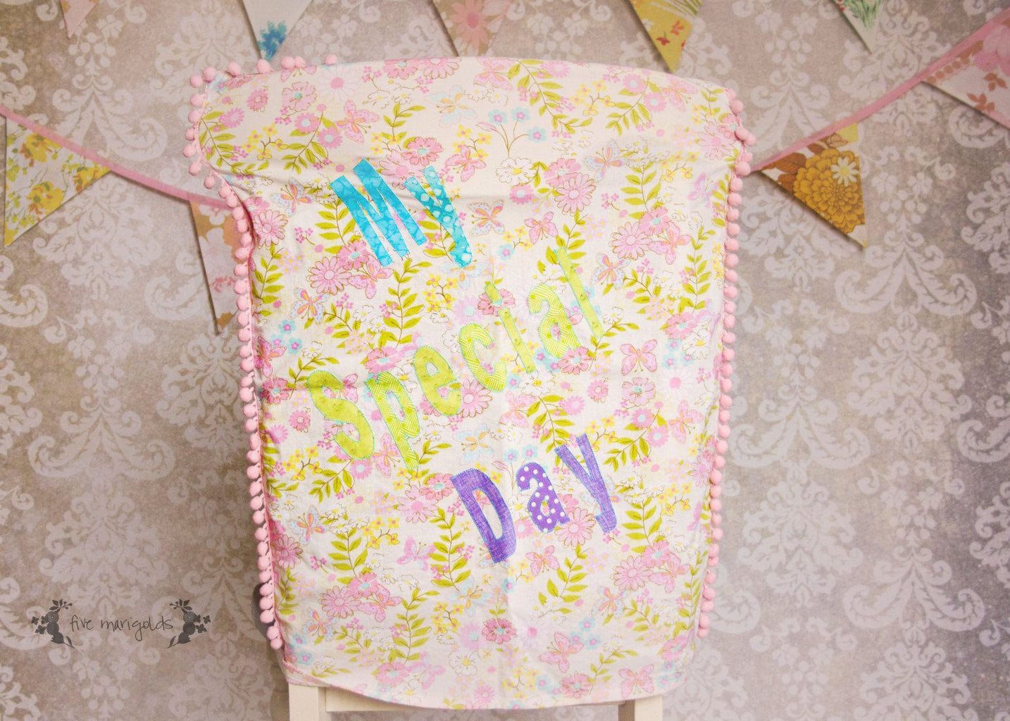 Baby Girl Bow Birthday Party Chair Cover | Five Marigolds