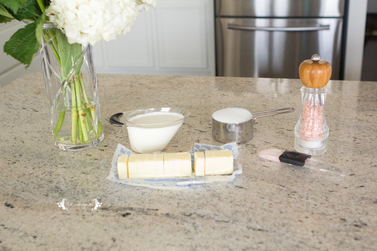 Create a Salted Caramel Apple Bar with this decadent Salted Caramel sauce and your favorite sweet and savory toppings. | Five Marigolds