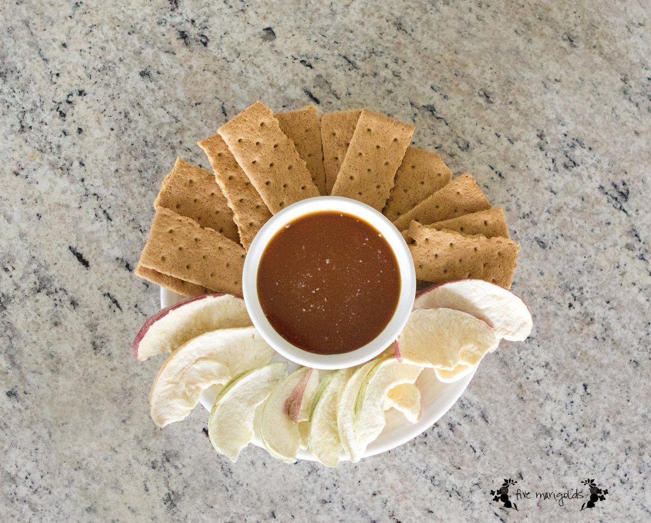 Create a Salted Caramel Apple Bar with this decadent Salted Caramel sauce and your favorite sweet and savory toppings. | Five Marigolds