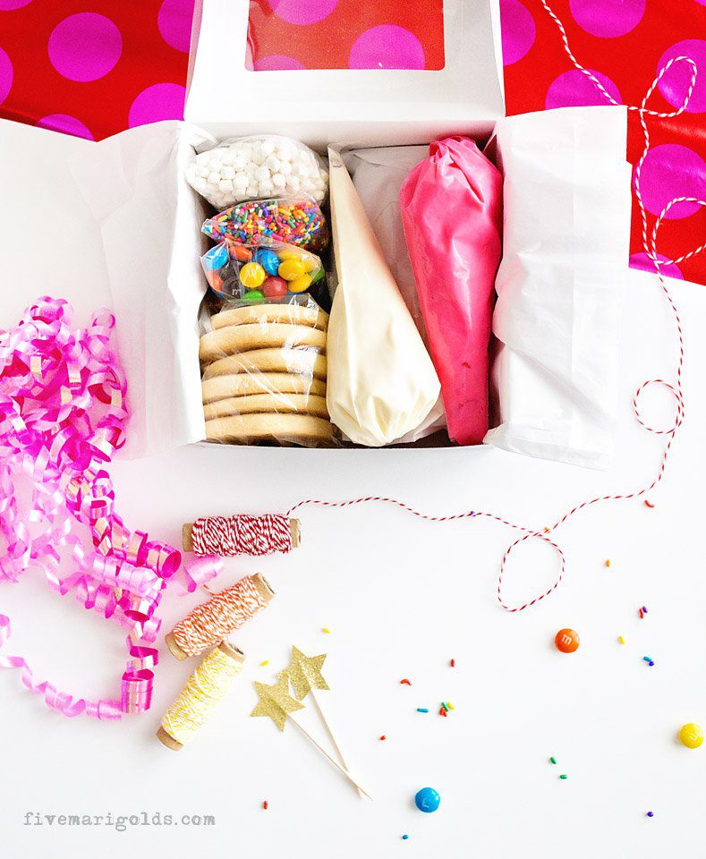 Great family gift idea: DIY cookie decorating kit. Include sugar cookies or gingerbread, frosting, and sprinkles. #MerryAndBright #ad