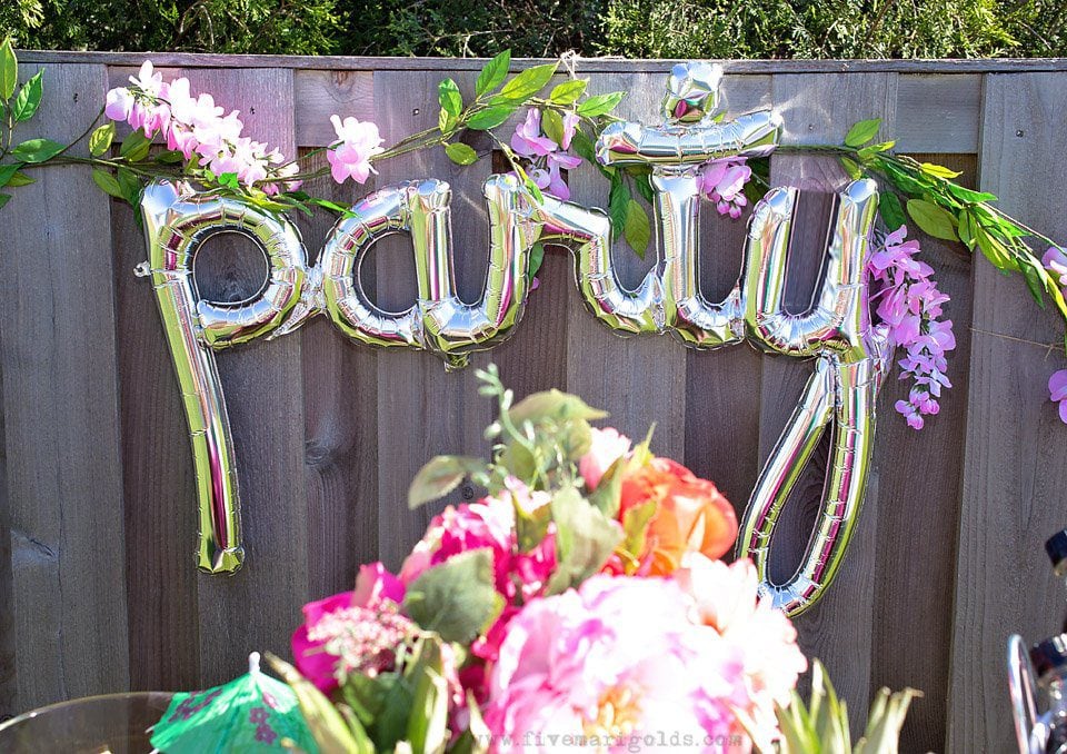 Chill and grill for a laid back summer barbecue. Tutorial for turning a dollar store tablecloth into a custom memory blanket for gatherings. Free printable favor tags for sparklers. 