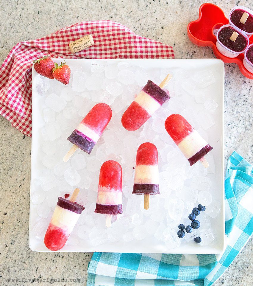 Red White and Blue Popsicles for adults using fruit, cream and your favorite wine.