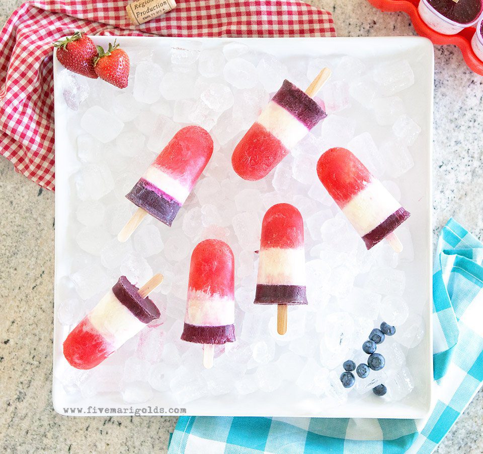 Red White and Blue Popsicles for adults using fruit, cream and your favorite wine.