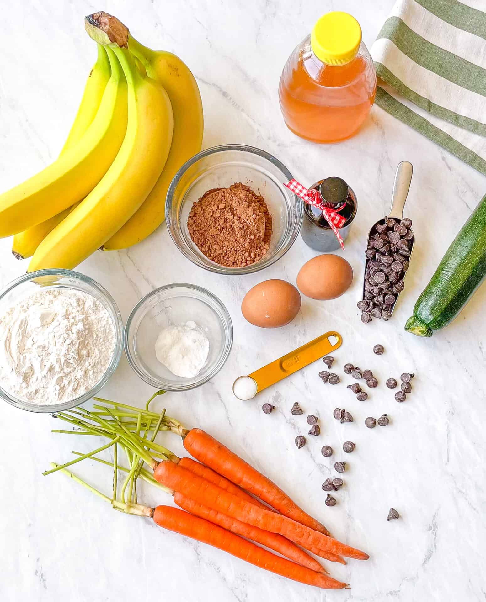 Photo of carrots, zucchini, banana and a chocolate muffin