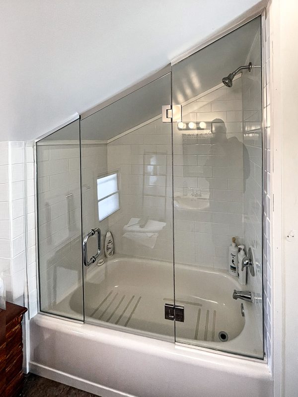 project fort showers bath wall to wall angled to the ceiling