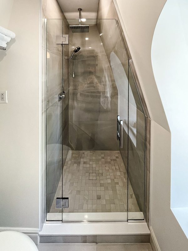 project fort showers custom angle cut frameless with chrome swing
