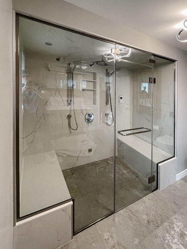 project fort showers steamroom custom wrapped chrome channels frameless swing