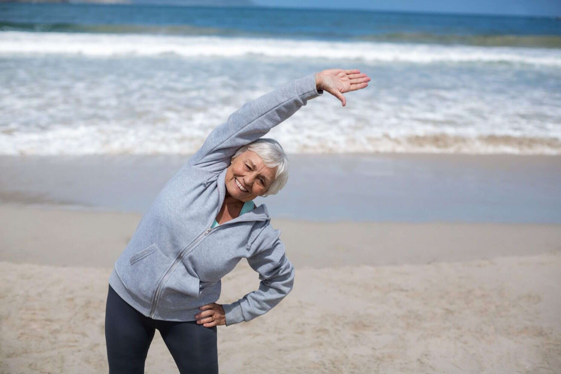 Woman Stretching After Knee Replacement Surgery