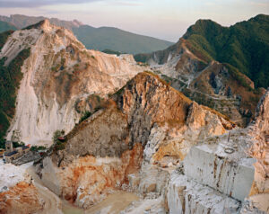 Excavation site with mountain range in the background. Edward Burtynsky, Quarries series.