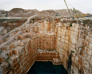 Tiered rock layers at an excavation site. Edward Burtynsky, Quarries series.