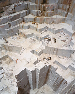 Aerial image showing geometric sharp-edged quarry excavation. Edward Burtynsky, Quarries series.