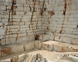 View of the corner of a layered quarry pit. Edward Burtynsky, Quarries series.