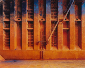 Large rusted wall with ladder and staircase. Edward Burtynsky Shipbreaking