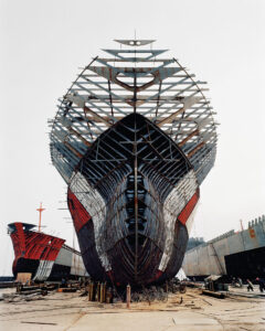 Massive half-constructed ship. Edward Burtynsky: Extraction / Abstraction.