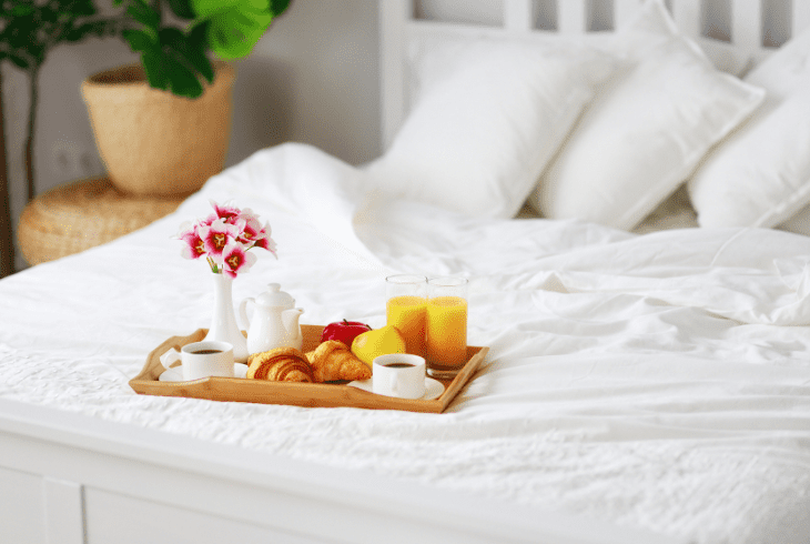 eating on hotel bed