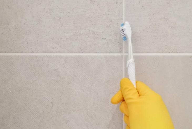 scrub tiles toothbrush