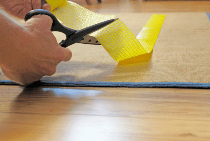 tape rug down