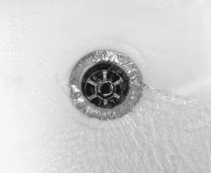 pour vinegar in sink