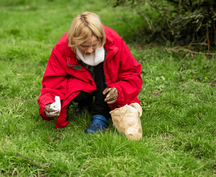 cleaning up neighbor's dog poop