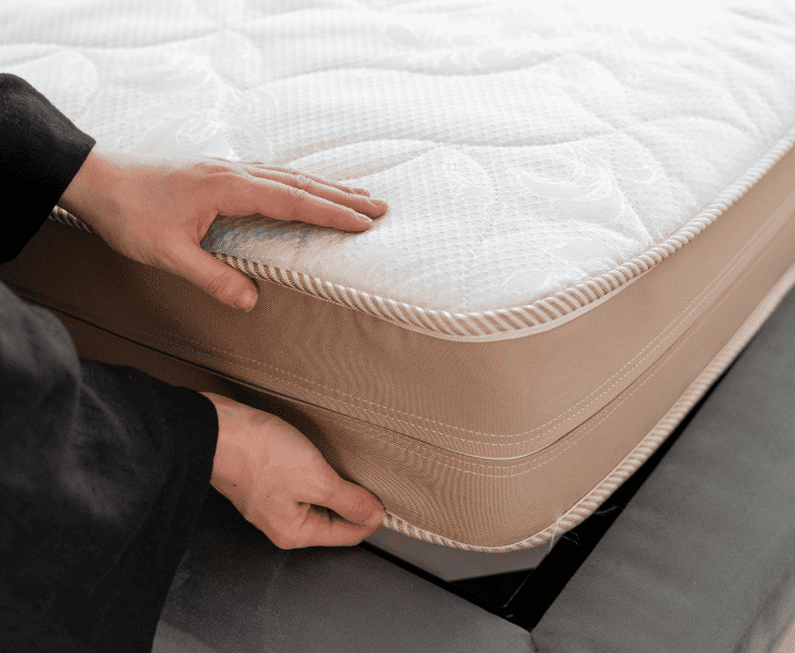 putting a foam mattress