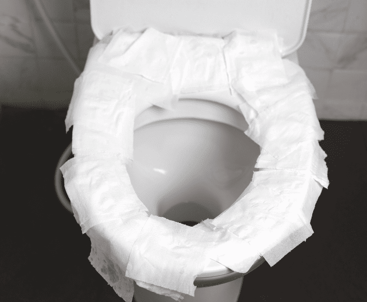 toilet seat covers bunch of tissues