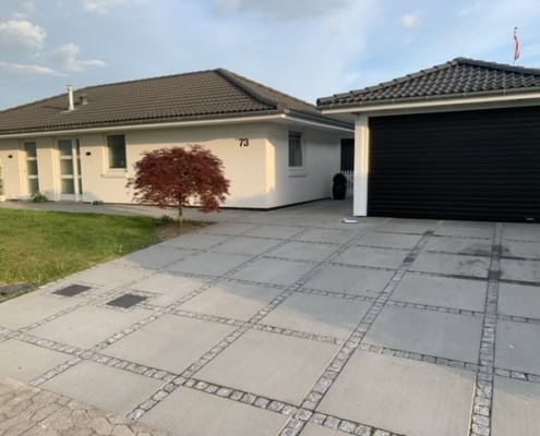 Brolægger indkørsel