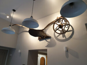Feature lighting for sculptures mounted on a call in a house in Wiltshire