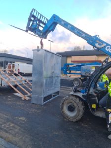 Lifting the wiring case in place