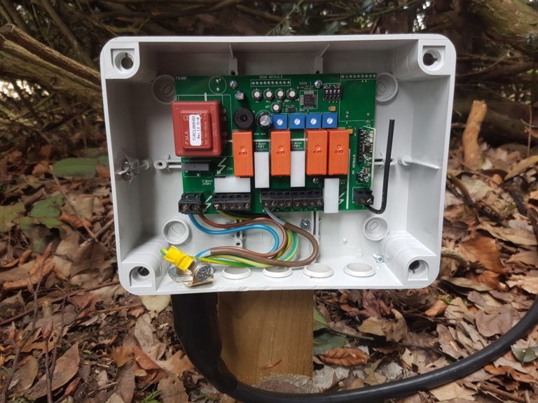 weatherproof outdoor electrical box powering the tree uplighters
