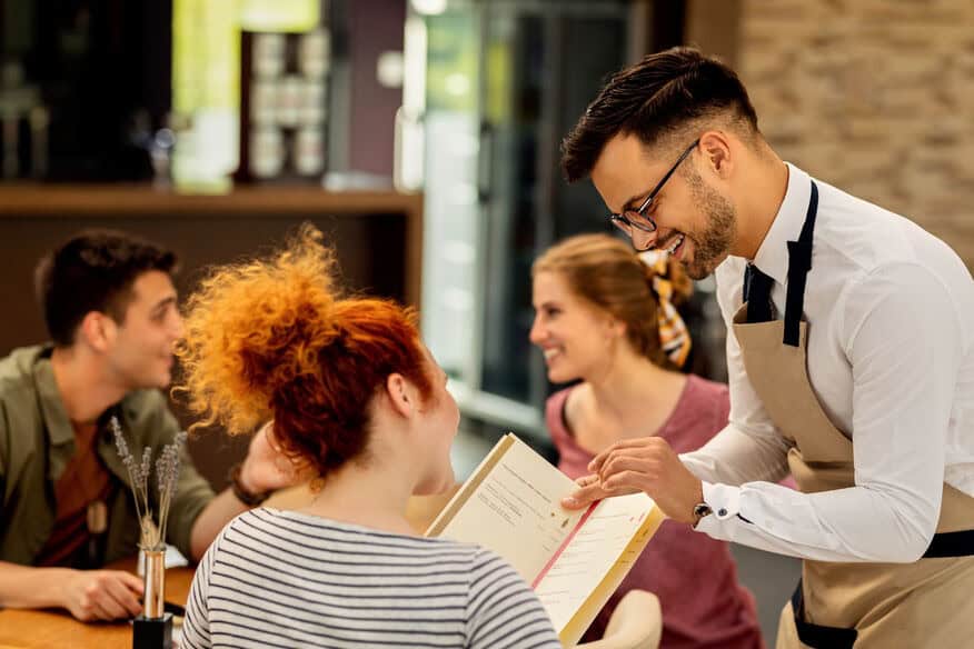 A friendly waiter explains the special diet meals that have become a popular kitchen trend.