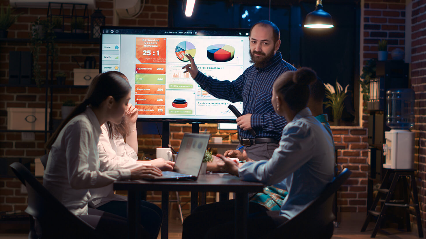 company-employee-presenting-analytics (1)
