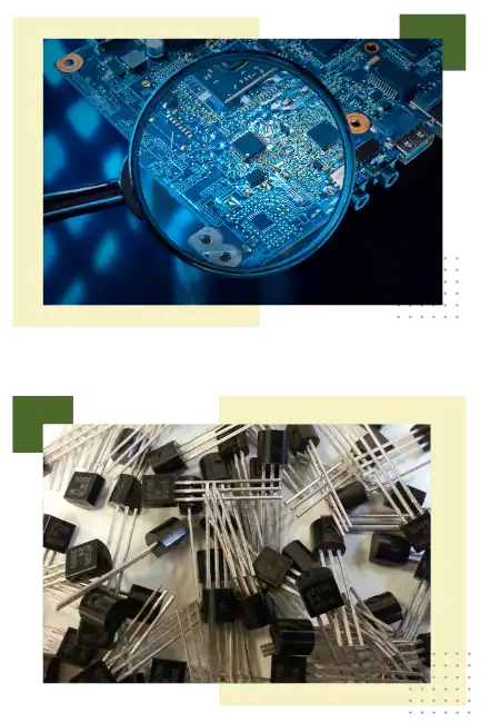 Electronics circuit board with magnifying glass highlighting microchips and components.